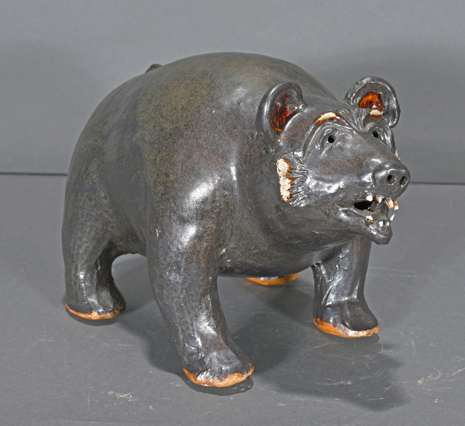 Patrick Shields. Black Bear.: Patrick Shields. Black Bear. 2009. Signed and dated. Glazed pottery. Mint condition. 10" long. Est $100-200. Ship: $45