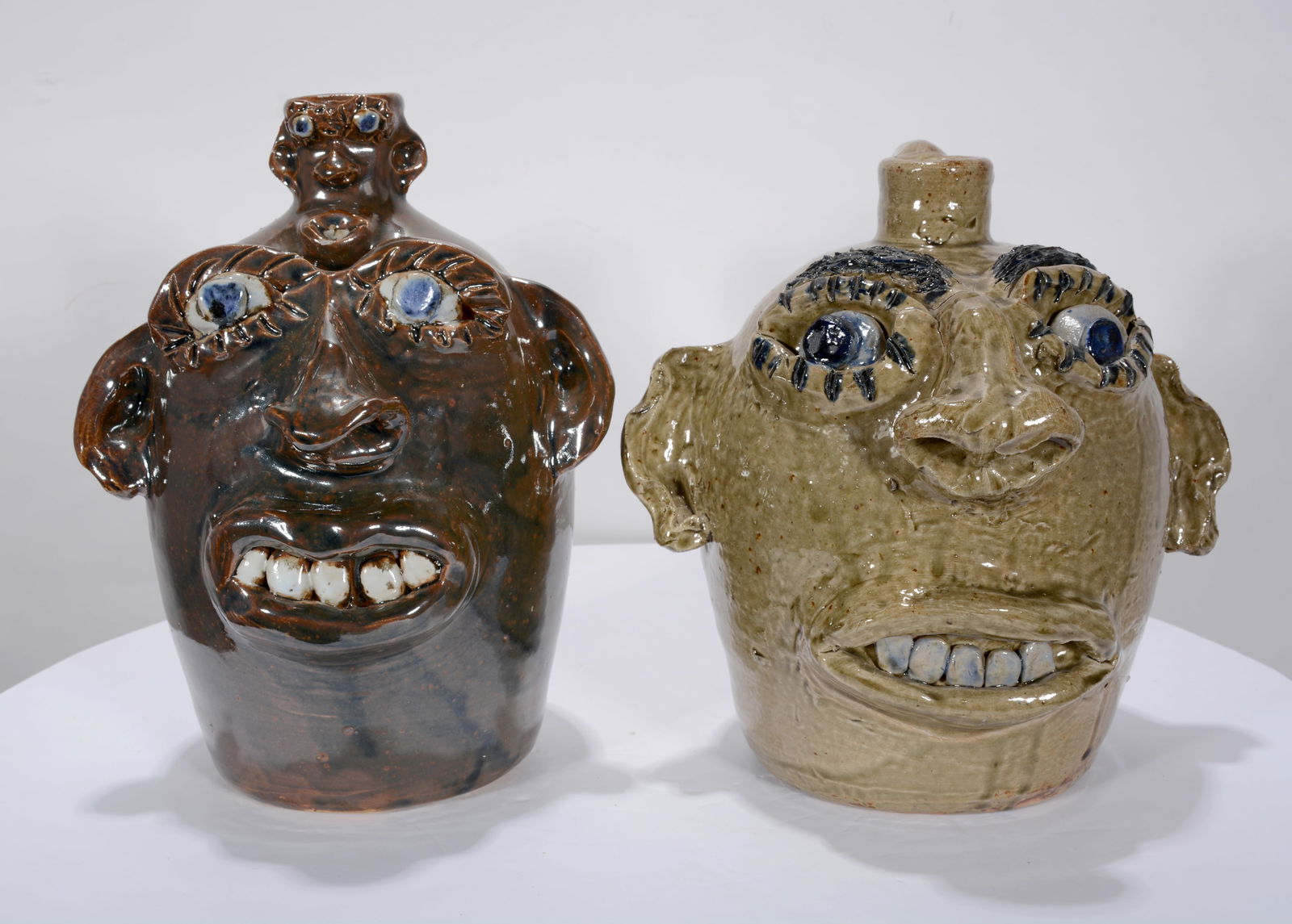 Jerry Brown. Pair of Large Feature Face Jugs. (1 of 3)