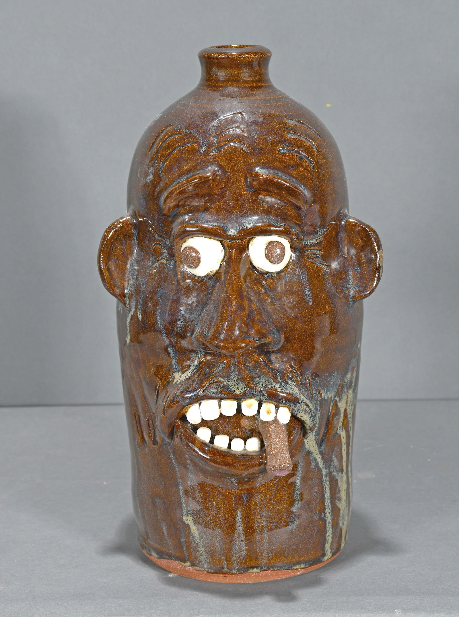 Harold Ferguson.  Slender Face with Cigar. (1 of 3)