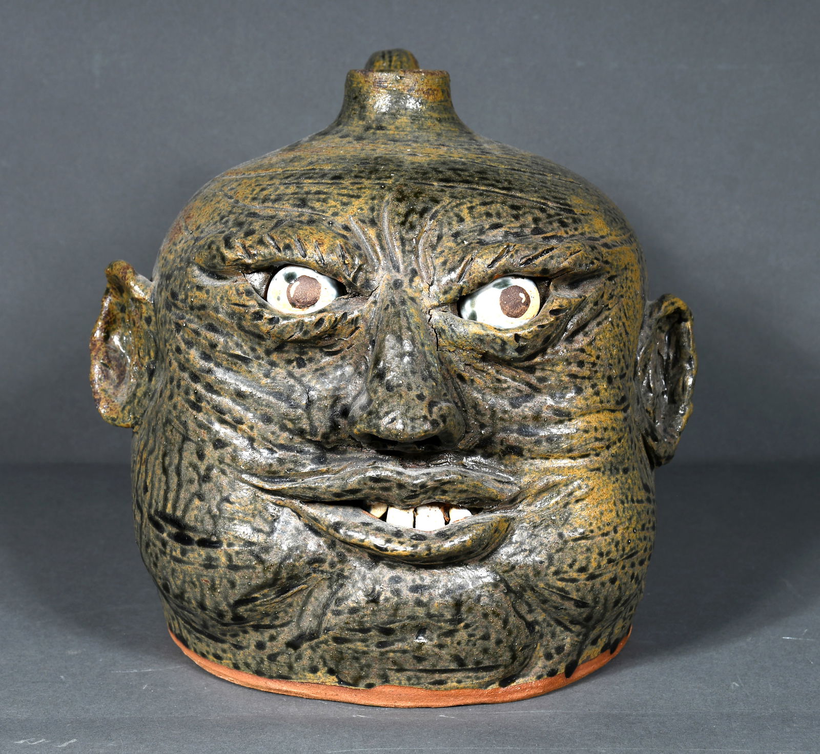 Nan Dean.  Large Buggy Face Jug. (1 of 3)