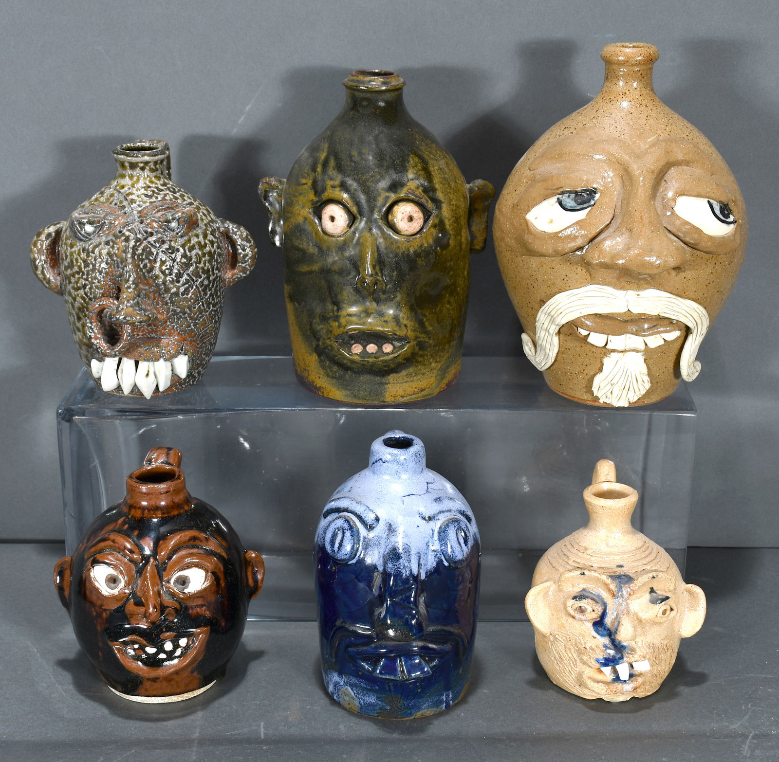 Unknown, Luck, Bennett, and Allmon.  Six Half Pint Size Face Jug. (1 of 2)