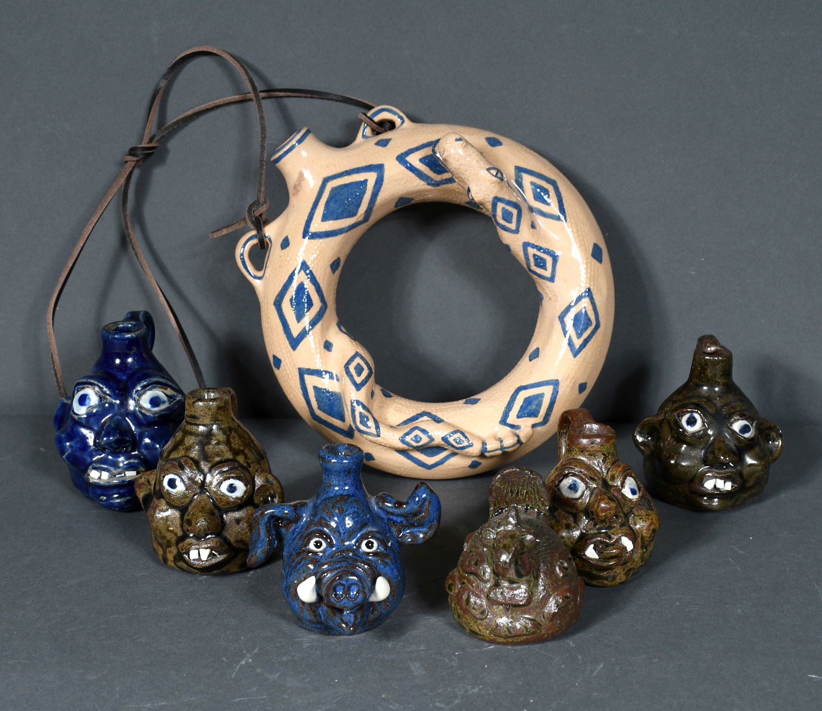 Lambert, Hewell, and Crocker.  Six Mini Face Jug and One Ring Jug. (1 of 2)