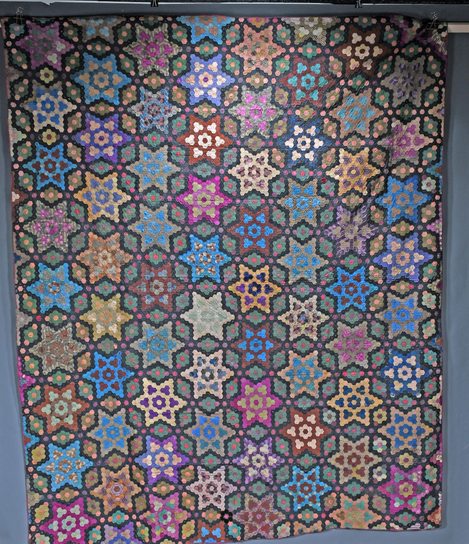 A. Boyd. Multi-Colored Star Quit.: A. Boyd. Multi-Colored Star Quit. c. 1910-20. Velvet and cotton backed to linen. Expected and minor thinning, otherwise excellent condition. 74" x 95". Est. $300-500. Ship: $35