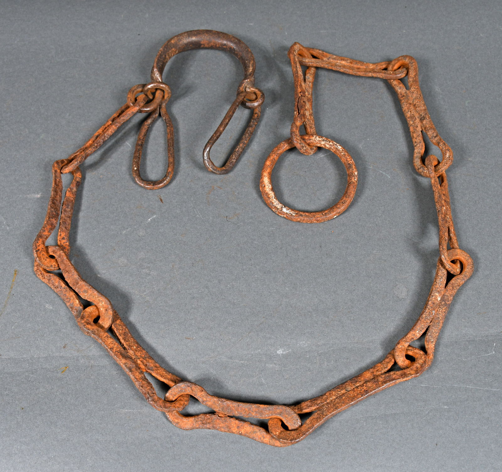 Wrought Iron Slave Shackles.: Wrought Iron Slave Shackles. Hand forged metal. Original condition with rust and patina, otherwise excellent condition. 40" long. Provenance: The Richard Harris African American Experience Collection.
