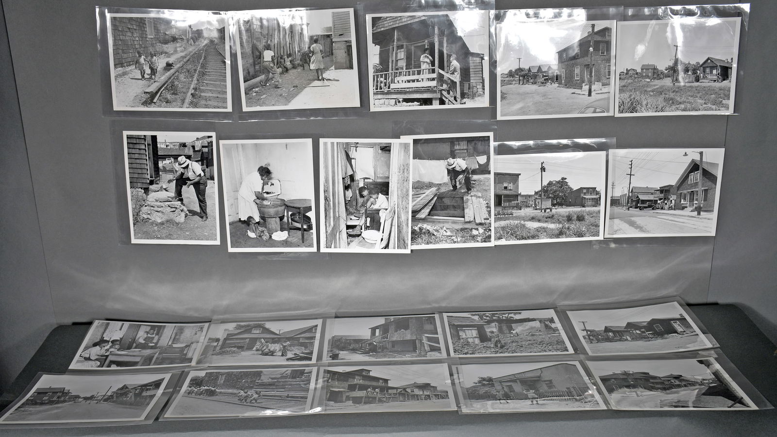Twenty one black and white photos. Wrong Side of the Tracks: Black Rural Life.: Anonymous. Twenty one black and white photos / silver gelatin prints. Wrong Side of the Tracks: Black Rural Life. c. 1940's-50’s. Average size is 9" x 7". Excellent condition. Provenance: The Richar