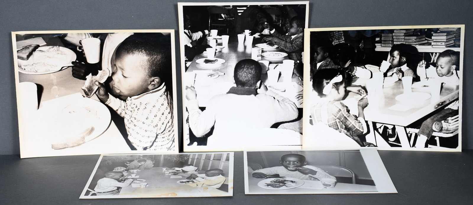 Mary Wood Forman & Ellery G. Kington. 5 Photographs Dealing with Black Panthers & Free Breakfast: Mary Wood Forman and Ellery G. Kington. Group of Five Photographs Dealing with Black Panthers and Free Breakfast Program. c. 1969-1972. Black and white photos. Light wear with photographer stamp on ve