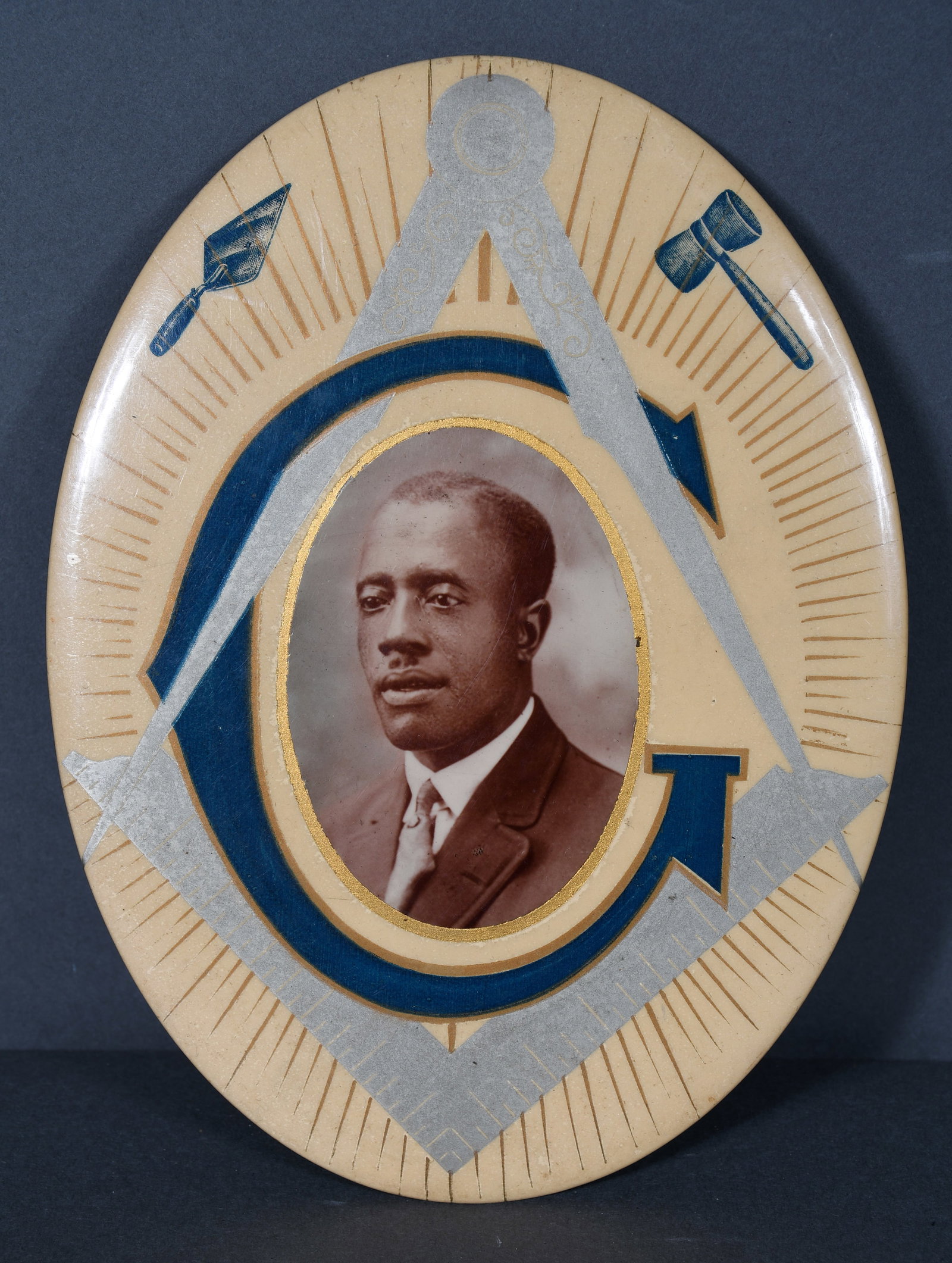Masonic. African American Large Pendant.: Masonic. African American Large Pendant. c. 1930's. Photo in painted enamel on tin. Excellent condition. 6" w x 8" h. Provenance: The Richard Harris African American Experience Collection. Est. $100-2