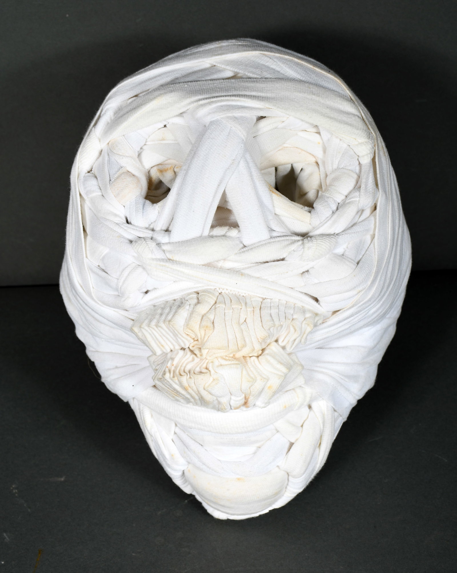 Contemporary Cloth Art Skull Sculpture.: Unknown Artist. Skull. Contemporary cloth art sculpture. c. 1970's. Excellent condition. 9" w x 12" h. Provenance: The Richard Harris African American Experience Collection. Est. $200-400. Ship: $55