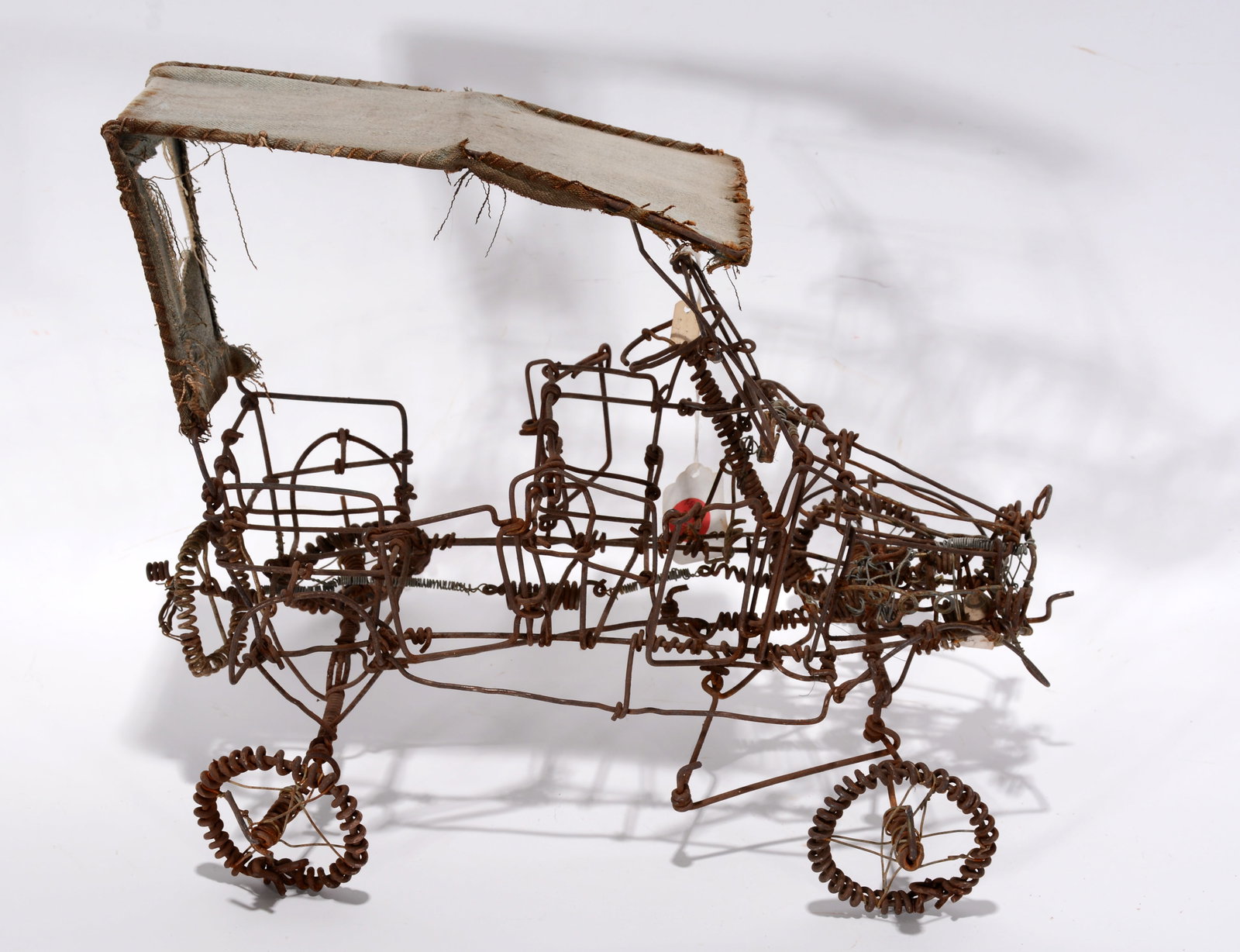 Vannoy Streeter. Model T.: Vannoy Streeter. Model T. Not signed. Hand-twisted metal wire and cloth sculpture. Great condition. 13" x 10" x 7". Est. $200-300. Ship: $45