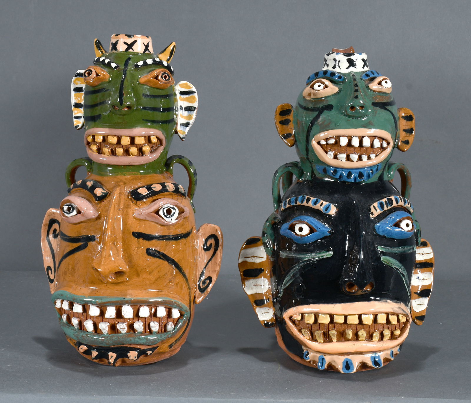 Carl Block. Pair of Totem Face Jugs. (1 of 3)