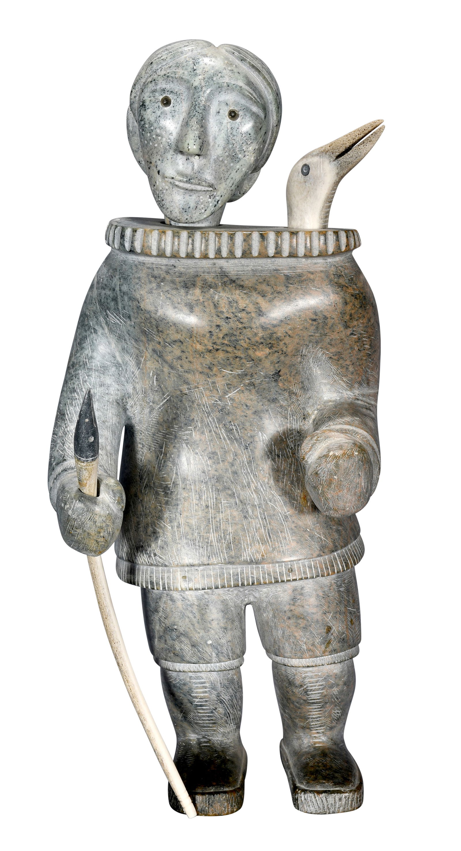 David Ruben Piqtoukun. Woman and Bird Figure.: David Ruben Piqtoukun. Inuit, b. 1950. Woman and Bird Figure. 1992. Signed and dated. Carved stone with bone bird head and cane. Excellent condition. 8" w x 17.5" h. Est. $800-1,200. Buyer is responsi