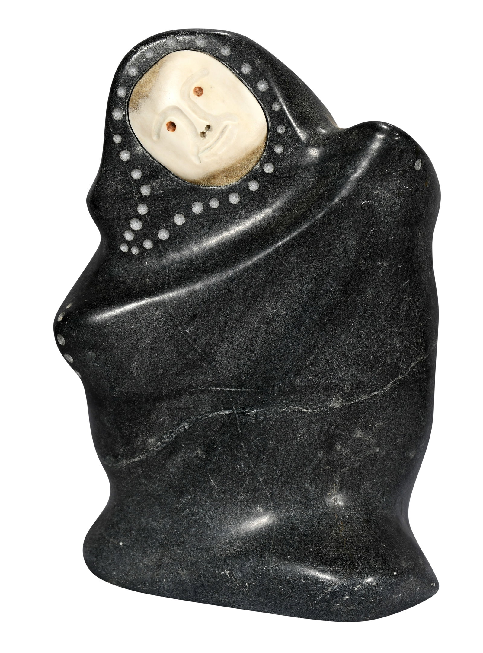 Mattiusi Iyaituk. Inuit Mother Inspecting Boy's First Polar Bear Skin.: Mattiusi Iyaituk. Inuit, b. 1950. Mother Inspecting Boy's First Polar Bear Skin. c. 1986. Signed and titled. Carved stone with inlaid bone. Excellent condition. 8" w x 12" h. Est. $300-500. Buyer is r