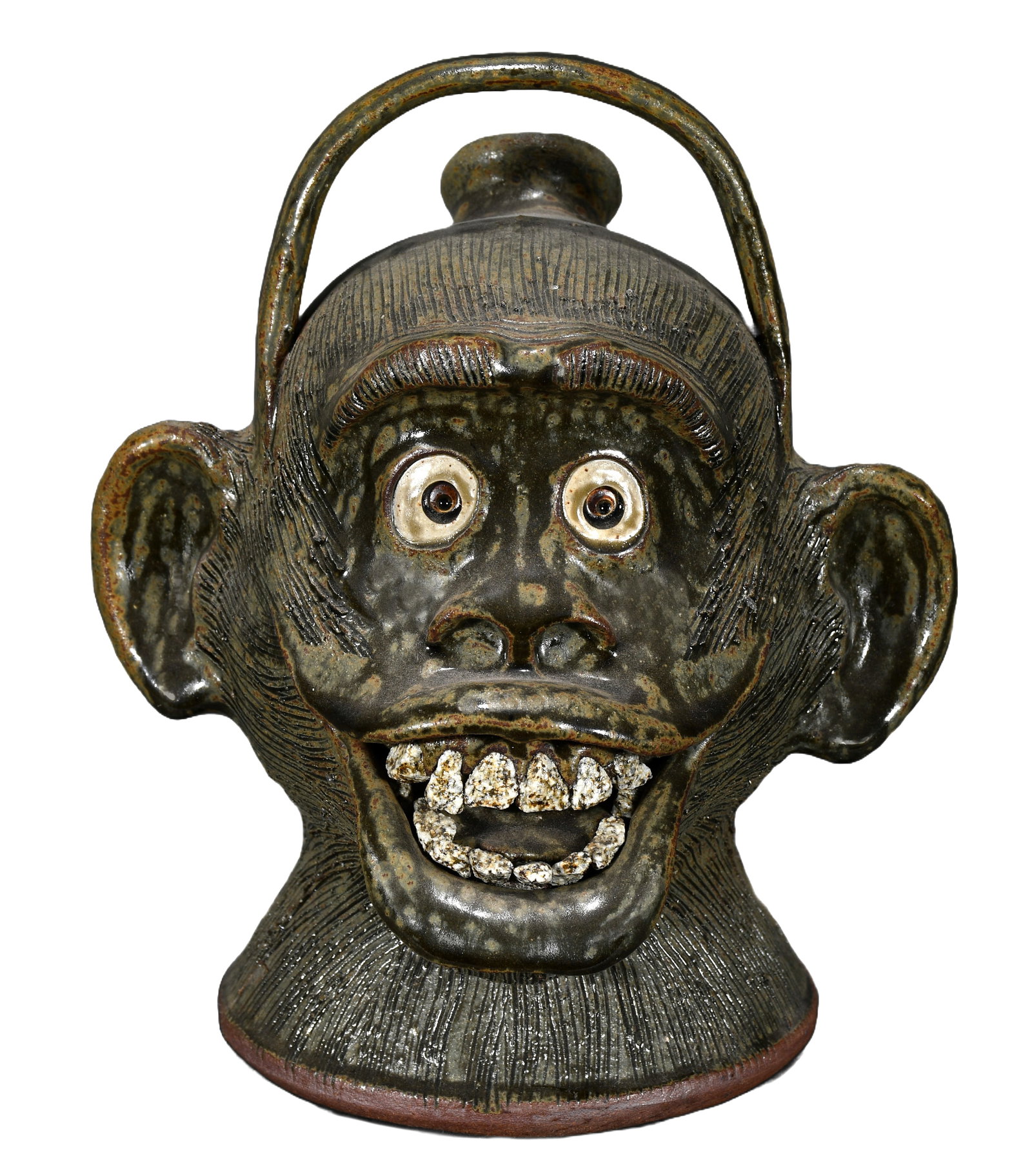 Michael & Melvin Crocker. Monkey Spout Face Jug.: Michael and Melvin Crocker. Monkey Spout Face Jug with Rock Teeth. 1995. Signed and dated. Mint condition. 10.5" h. Est. $200-400. Ship: $45