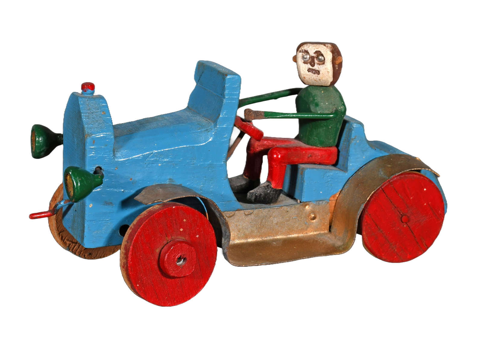 Carlton Garrett. Driving A Model T.: Carlton Garrett. Driving A Model T. Signed. Carved and painted wood with mixed media. Excellent condition. 4.5" h x 9" w. Est. $300-500. Ship: $45