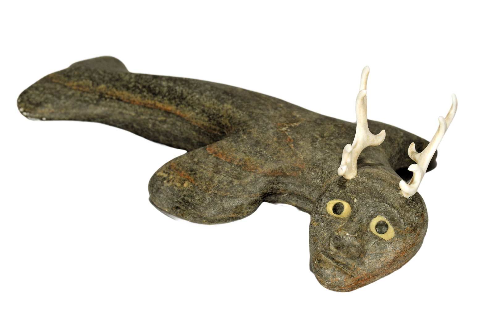 Inuit Anthropomorphic Man, Caribou and Seal.: Inuit. Anthropomorphic Man, Caribou and Seal. Signed. Carved serpentine with bone. Excellent condition. 10" long. Est. $200-400. Ship: $65