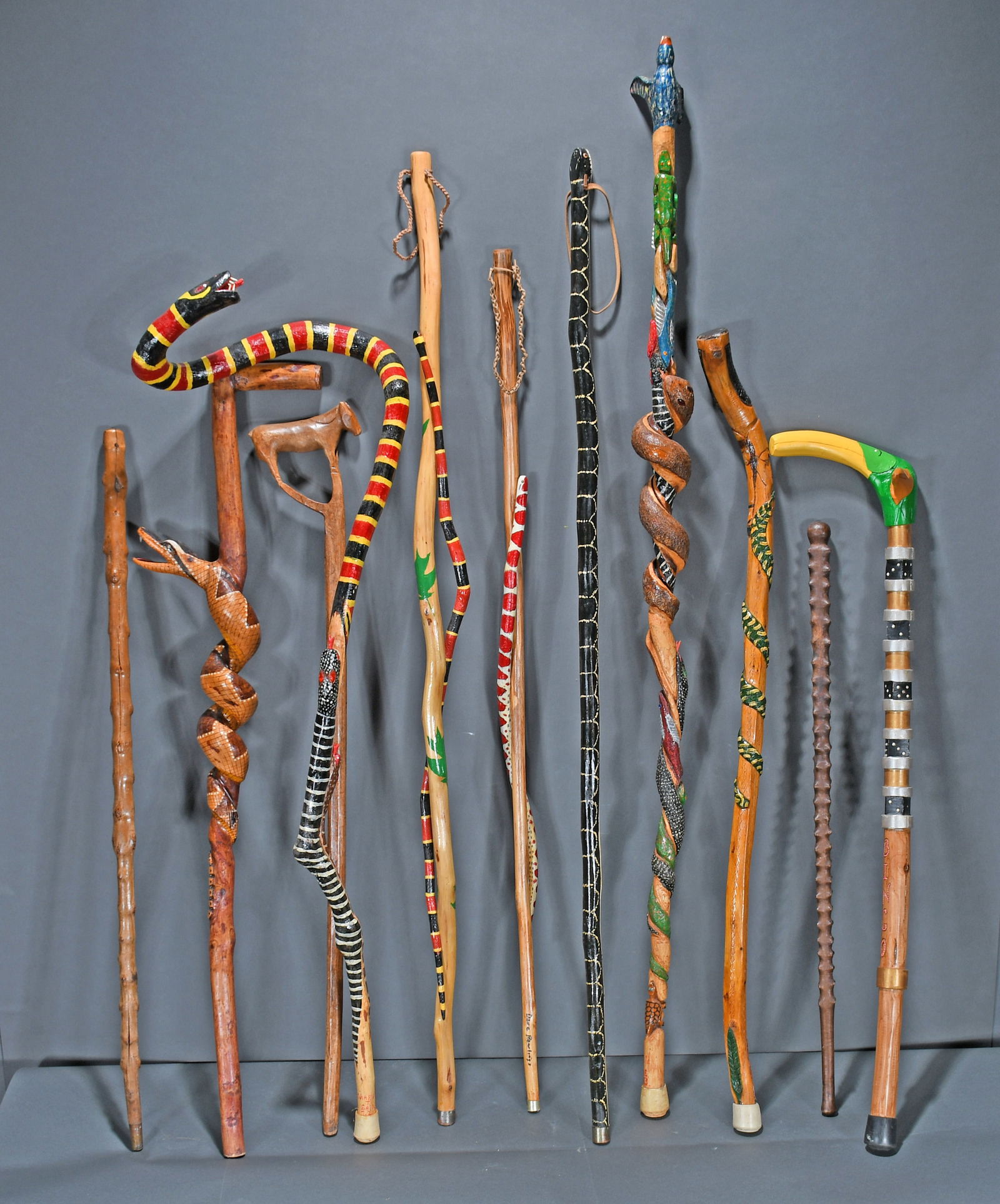 Rollings, Saine & Anonymous. 11 Carved & Painted Canes. (1 of 4)