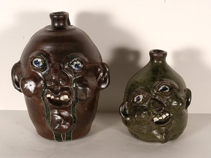 Grace Nell Hewell. Pair of Face Jugs.: Grace Nell Hewell. Pair of Face Jugs. 2005. Signed and dated. Tallest is 11” h. Mint condition. Est. $200-300. Ship: $65