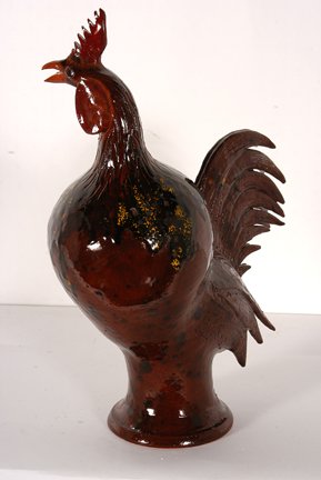 Charlie West. Brown & Yellow Highlights Rooster.: Charlie West. Brown and Yellow Highlights Rooster. Pottery with heavy glaze. Mint condition. Signed. 17” h. Provenance: The Ted Oliver Collection. Est. $200-300. Ship: $75