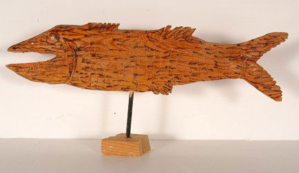 Elijah Pierce. Fish On A Stand.: Elijah Pierce. Fish On A Stand. Signed. Carved wood with glitter, marker and jewelled eyes. Missing one scale on fin, otherwise excellent condition. 6.5” x 13.5” x 1.5” including stand. Property