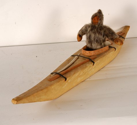 Inuit. Sea Hunter.: Unknown Inuit. Sea Hunter. Not signed or dated. Seal fur with hide and wood. Excellent condition. 24” long x 7”h. Est. $200-400. Ship: $45