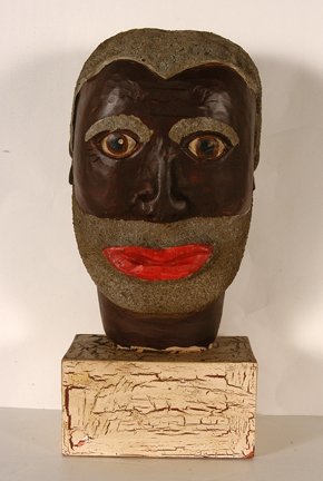Anonymous Black Man’s Bust.: Anonymous Black Man’s Bust. Not signed or dated. Carved and painted wood with saw dust mixture for hair. Excellent condition. 12” x 5” x 4”. Provenance: The Columbus Museum, Columbus, GA. Est.