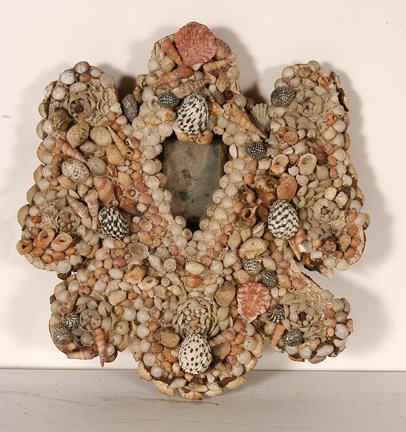 Heart Shaped Mirror Shell Frame.: Anonymous Heart Shaped Mirror Shell Frame. Not signed or dated. Seashells on board with mirror. Great condition. 11” x 12”. Provenance: The Columbus Museum, Columbus, GA. Est. $200-300. Ship: $35