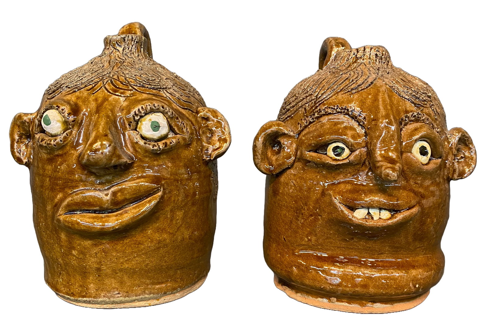 Reggie and Flossie Meaders. Husband and Wife Pair of Jugs (A).: Reggie and Flossie Meaders. Husband and Wife Pair of Jugs (A). Signed. Mint condition. Largest is 7.5" h. Est. $200-400. Ship: $75