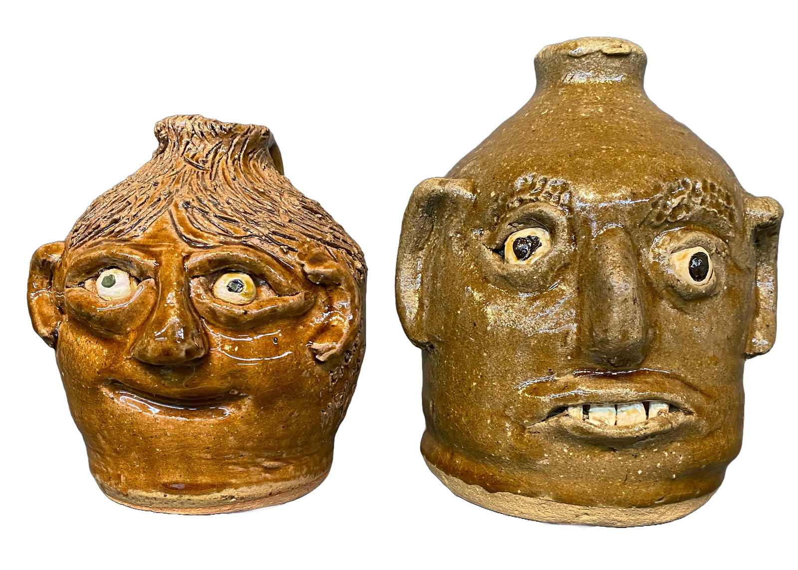 Reggie and Flossie Meaders. Husband and Wife Pair of Face Jugs (B). (1 of 3)