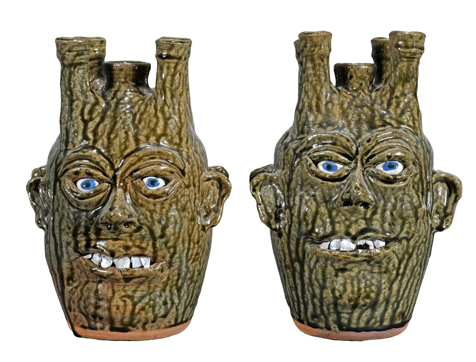 Cleater and Billie Meaders. Pair of Double Face-Rock Teeth Candelabras.: Cleater and Billie Meaders. Pair of Double Face-Rock Teeth Candelabras. 1993. Signed and dated. Mint condition. Each is 12" h. Est. $300-500. Ship: $100