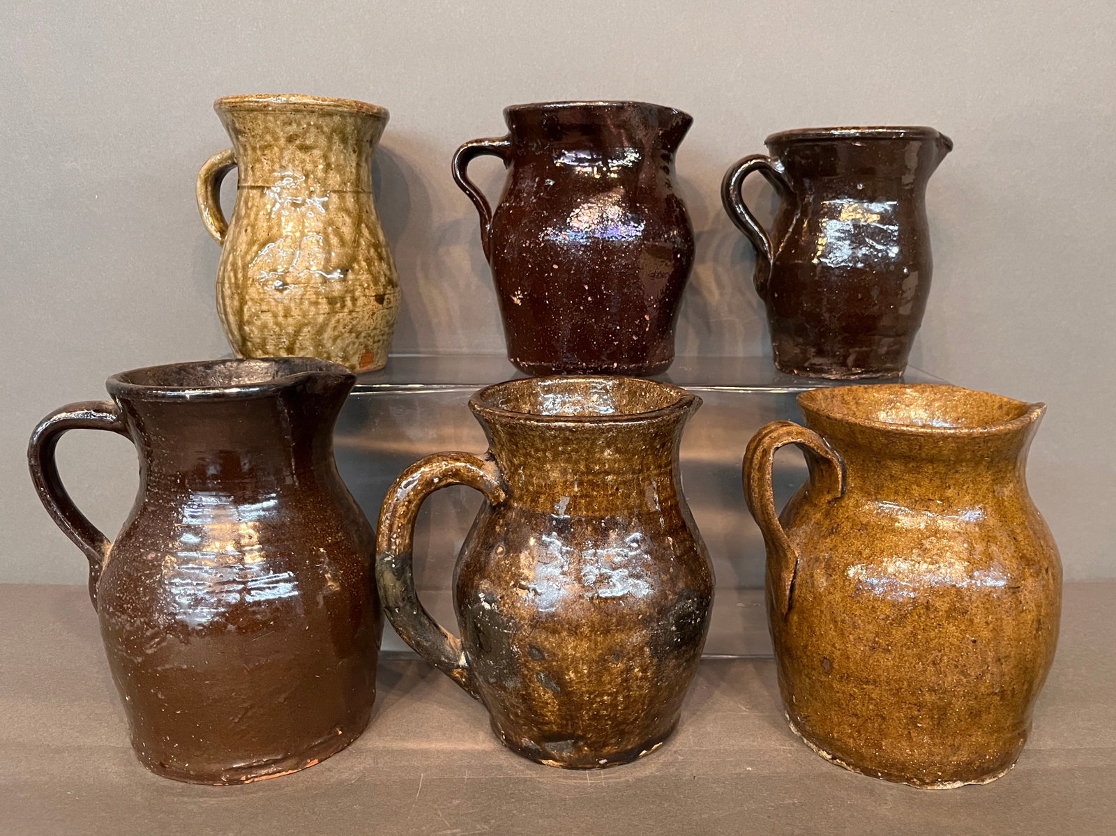 Anonymous Potters. Six Half Pint Pitchers.: Anonymous Potters. Six Half Pint Pitchers. Some have minor chips on rims, otherwise excellent condition. Largest is 7" h. Est. $100-200. Ship: $65