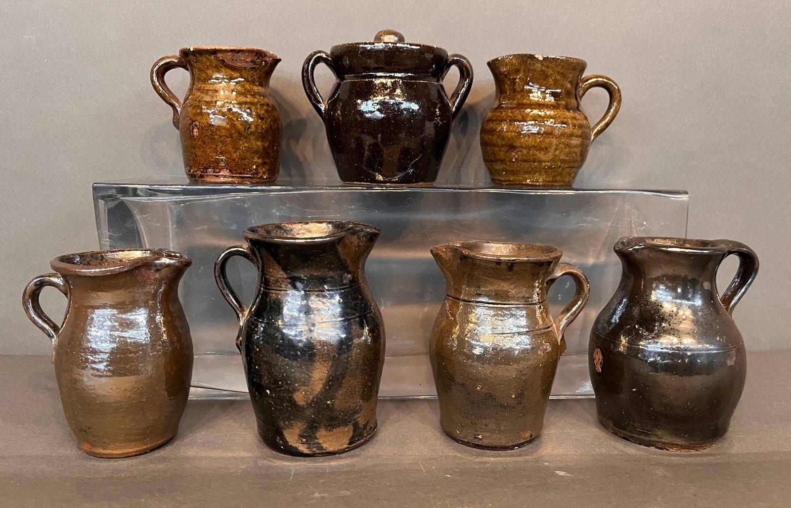 7 Half Pint Pitchers and 1 Mini Bean Pot. (1 of 3)