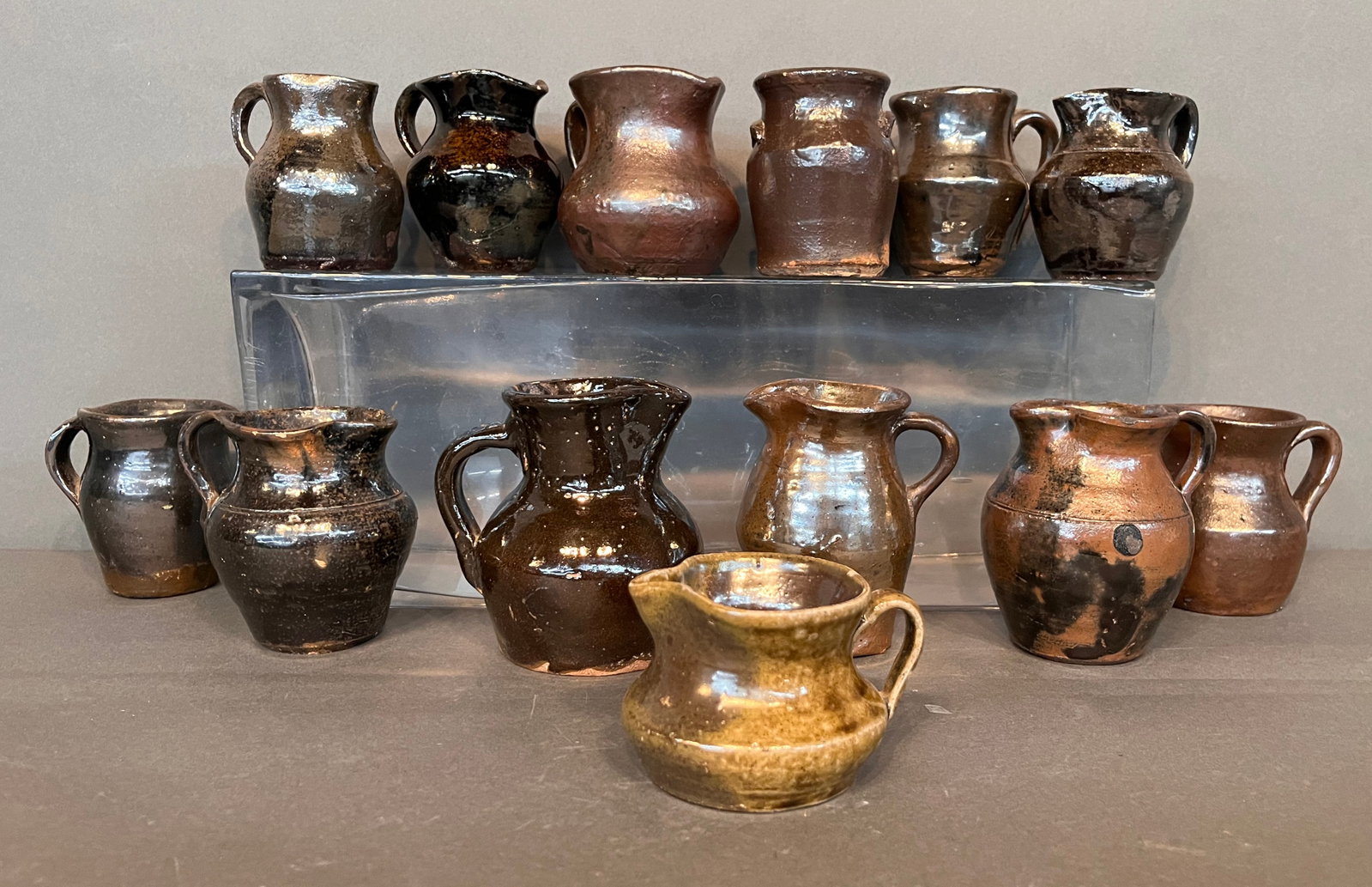 Anonymous Potters. 13 Mini Pitchers.: Anonymous Potters. 13 Mini Pitchers. Excellent condition. Average size is 3.5" h. Est. $100-200. Ship: $65