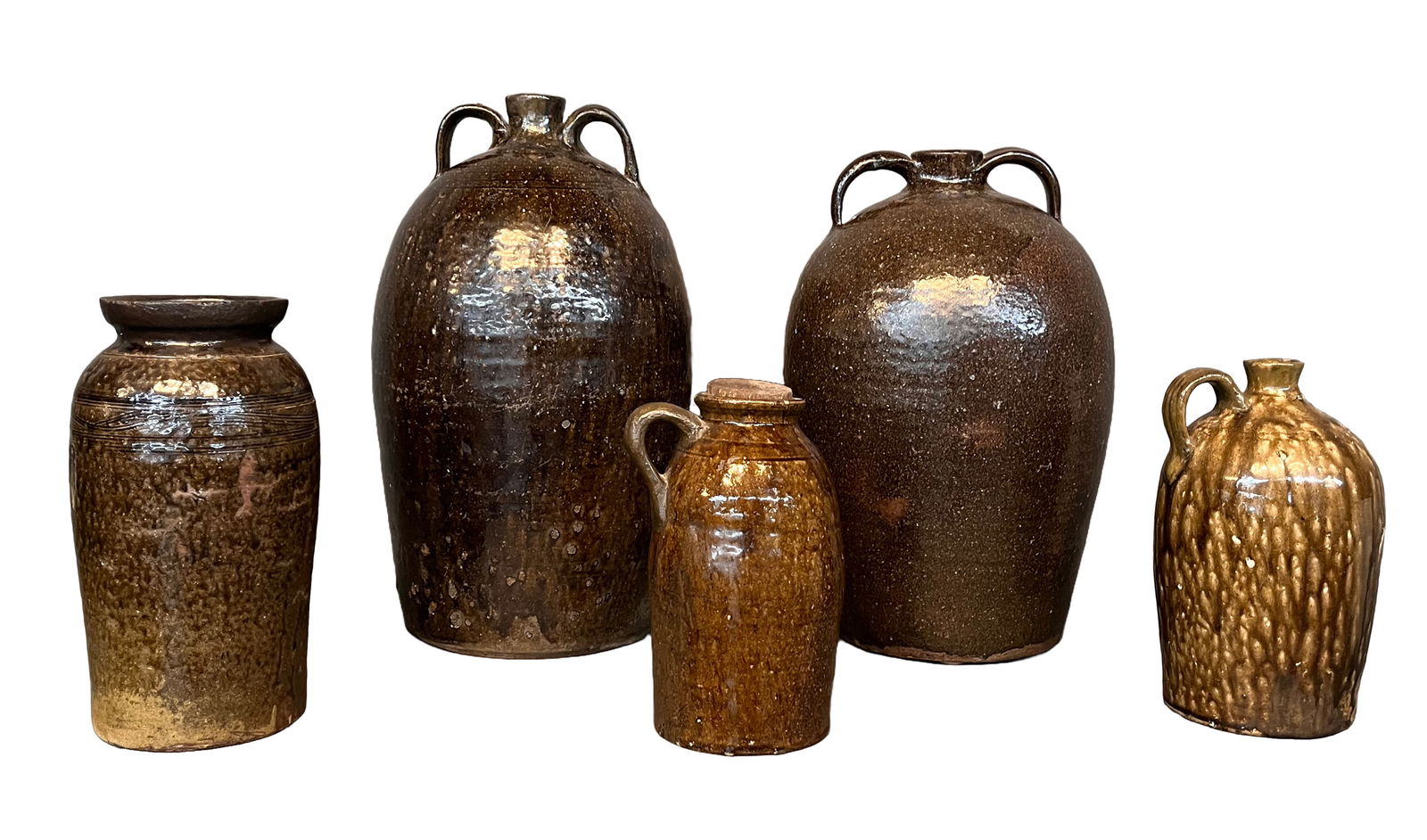 Group of 4 Professionally Repaired Anonymous Jugs. (1 of 4)