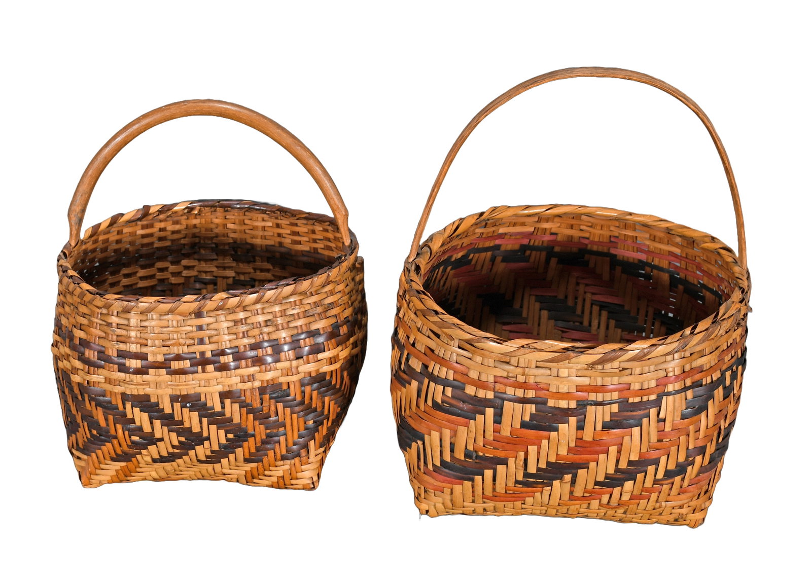 Pair of Oval Collecting Baskets.: Pair of Oval Collecting Baskets. River cane and natural dyes with oak handles. Excellent condition. 10" w x 13" h. Est. $200-400. Ship: $55