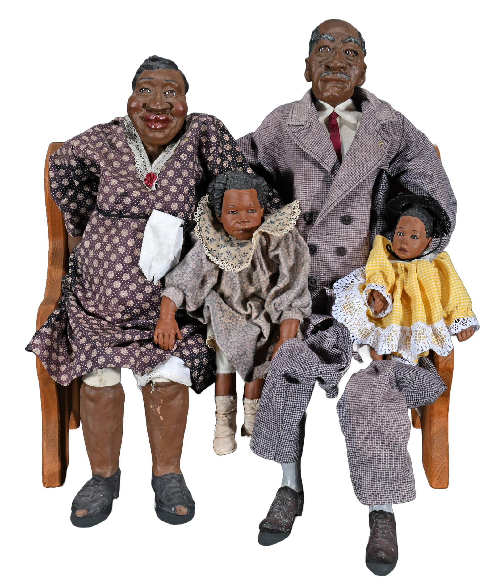 Unknown. Family on a Bench.: Unknown. Family on a Bench. Not signed or dated. Carved wood with mixed media features and homemade clothing. Great condition. Tallest figure is 25.5" h. Est. $100-200. Ship: $75
