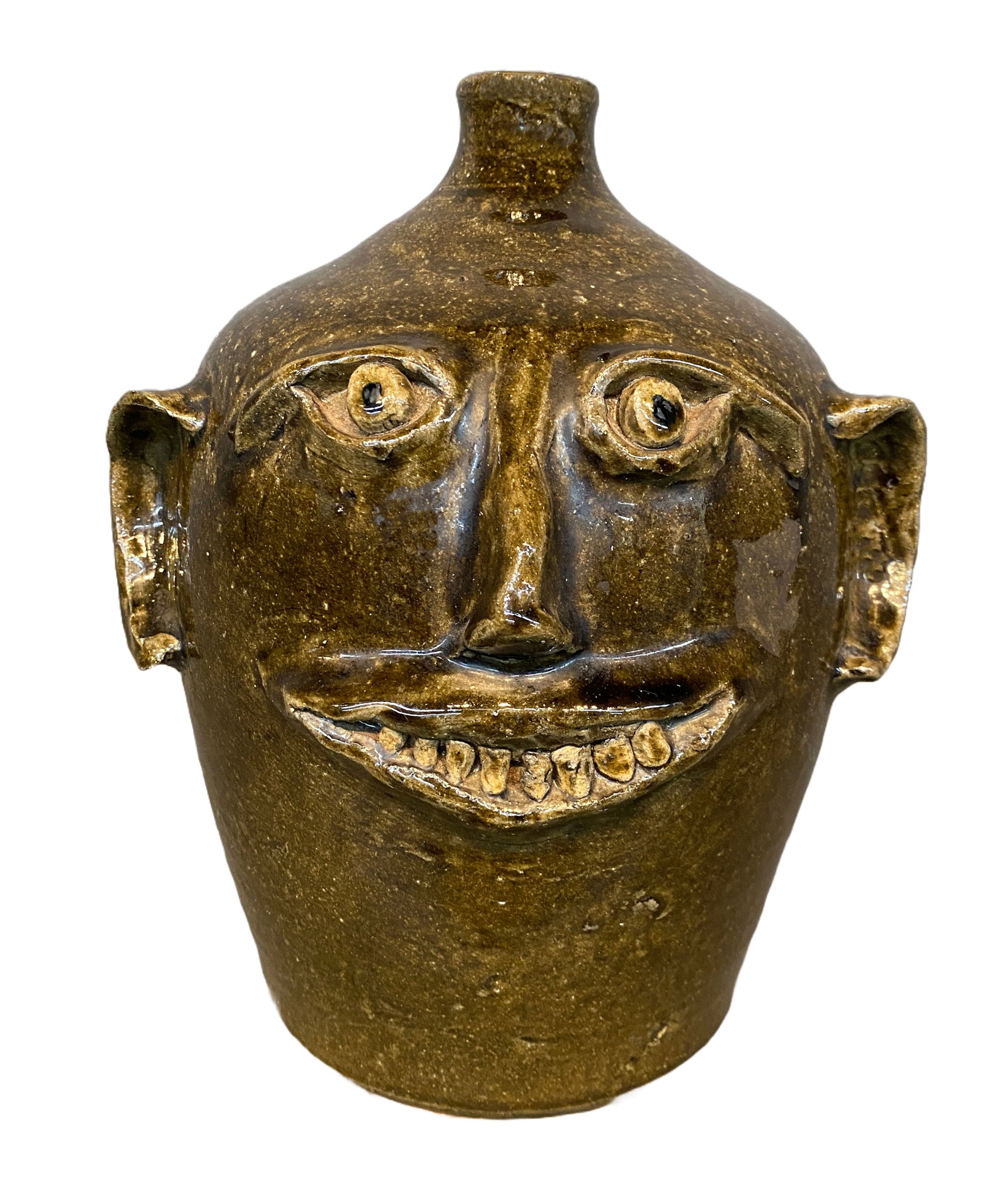 Reggie Meaders. Rook Tooth Face Jug.: Reggie Meaders. (1919-2009, Georgia). Rook Tooth Face Jug. Signed. Mint condition. 10.5" h. Est. $200-400. Ship: $55