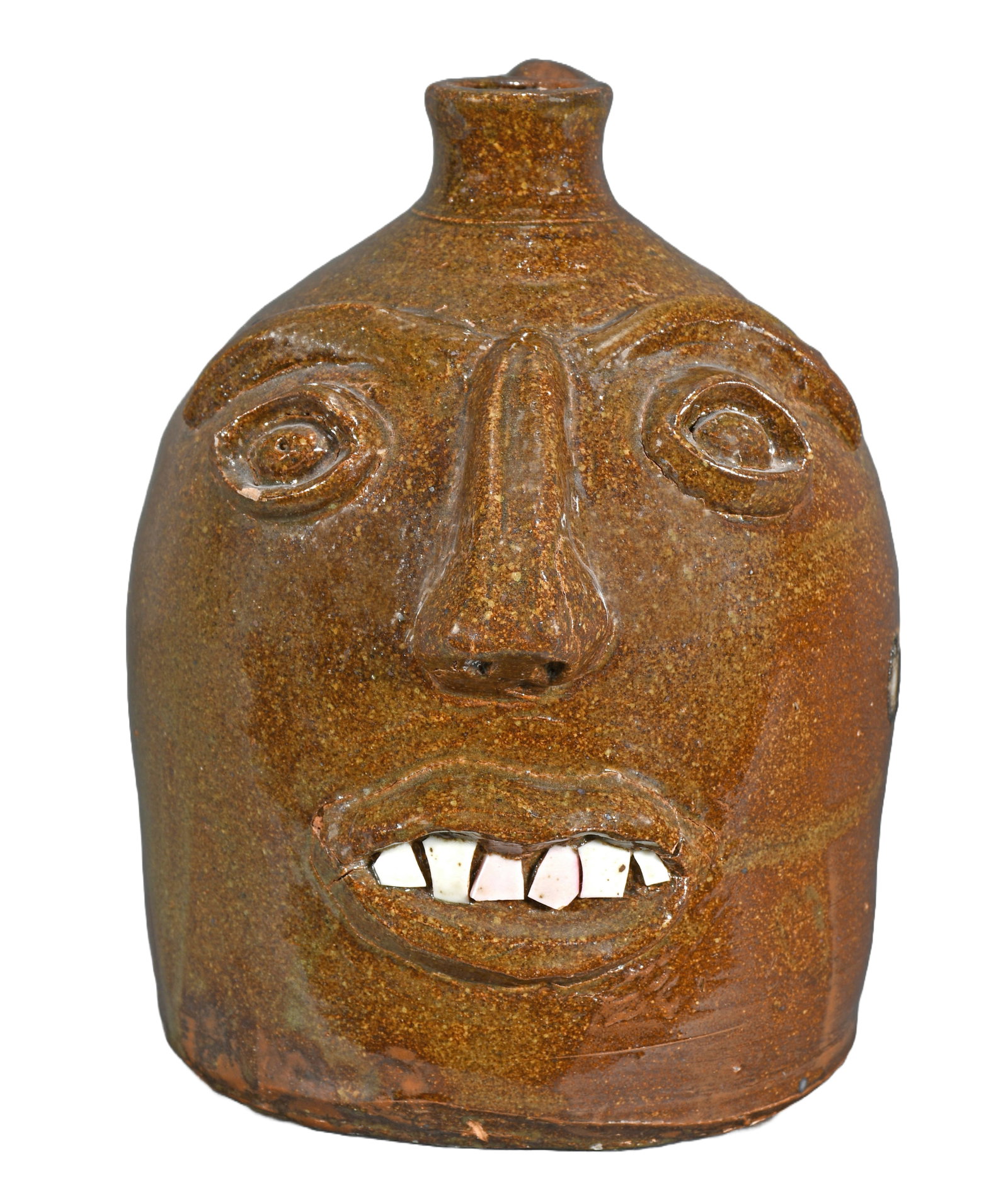 Incised One-Gallon Alabama Face Jug.: Unknown. Incised One-Gallon Alabama Face Jug. c. 1940-50's. Signed in script top left, 'T—MckenzIE, T or JERRy McKE__E, S_LLIGENT, ALA.' Jug was possibly made by Horace V. Brown, Jr. or brother Otto