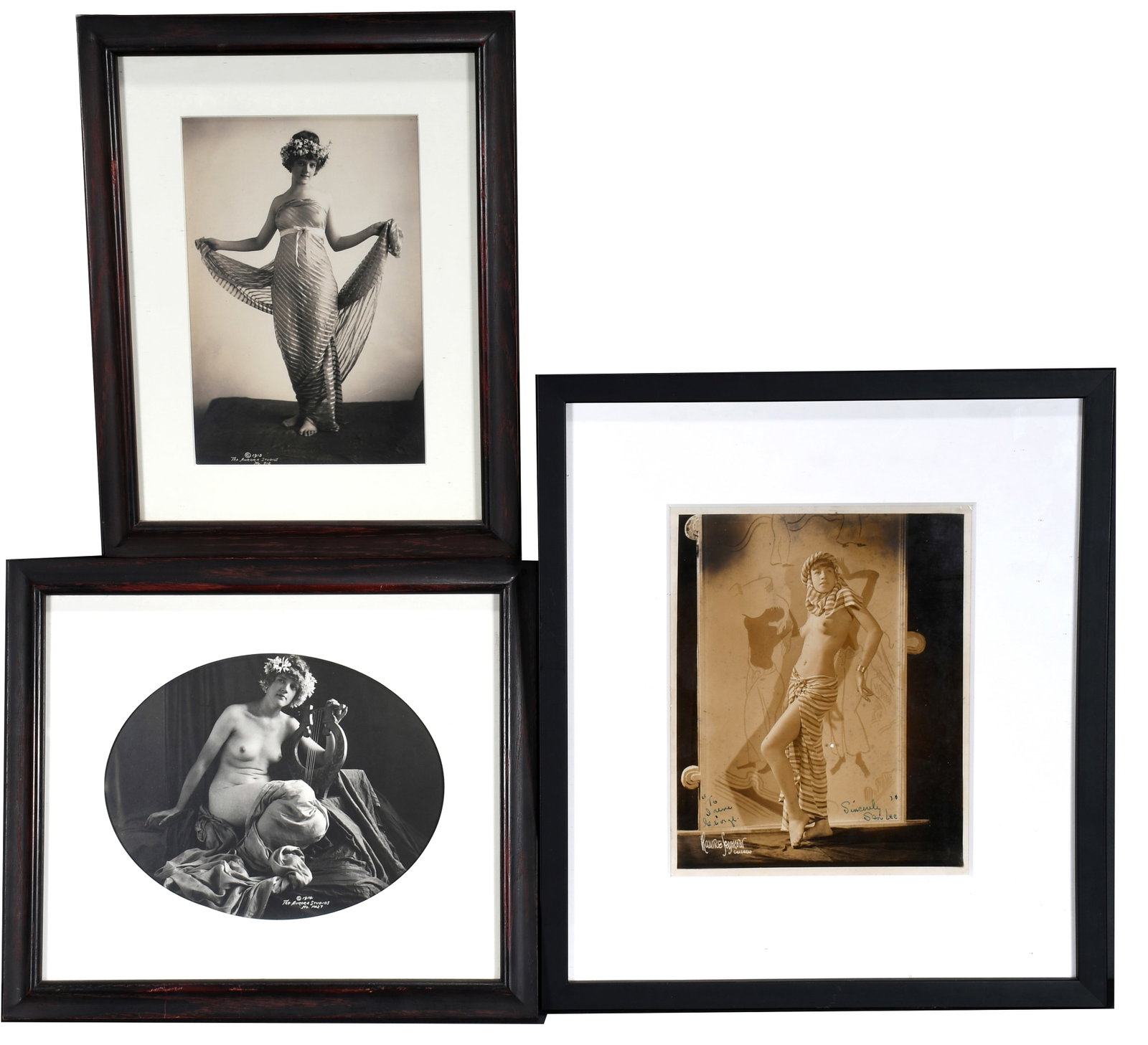 3 Erotic Photographs.: Anonymous. 3 Erotic Photographs. c. 1913. Stamped and dated. Black and white photos from Aurora Studios, Chicago. Excellent condition. Largest image size is 8" w x 10" h. Largest size with frame is 15