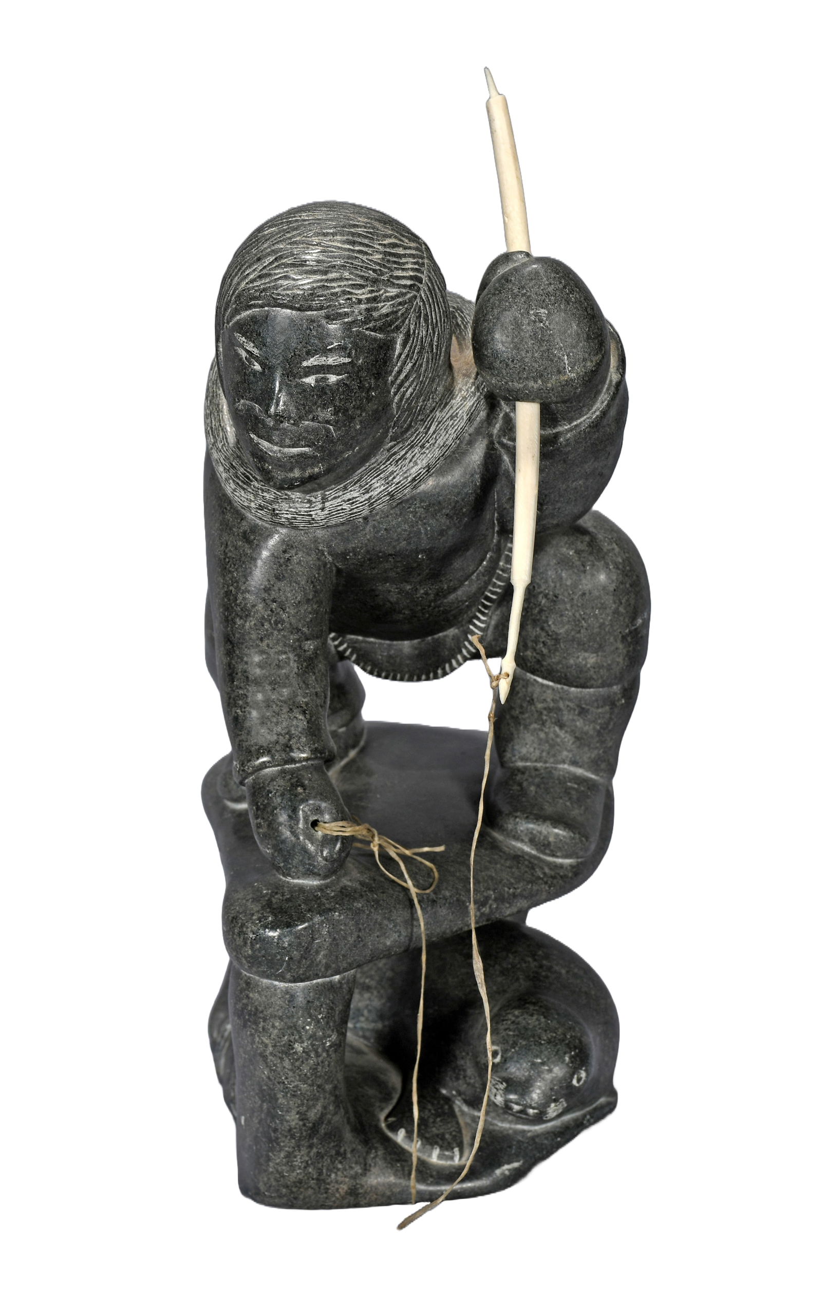 Adamie Anautak. The Seal Hunt.: Adamie Anautak. The Seal Hunt. 1986. Signed and dated. Carved serpentine with bone spear. Excellent condition. 10" w x 14" h. Est. $200-400. Ship: $85