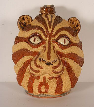 Billy Ray Hussey. Lion Face Jug.: Billy Ray Hussey. Lion Face Jug. Initialed and numbered, #33 on bottom. Mint condition. 9.5”h. Provenance: The Private Collection of Chuck and Jan Rosenak. Est. $800-1,200. Ship: $55