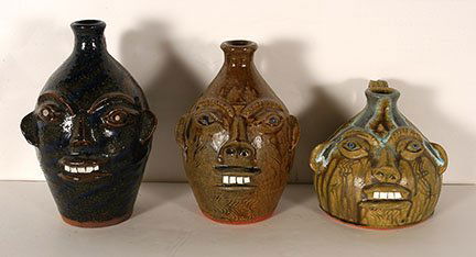 Walter Fleming. 3 Different Face Jugs.: Walter Fleming. Three Different Face Jugs. Swirl, Ash and Buggy. All are stamped and signed. Mint condition. Tallest is 10”h. Est. $200-300. Ship: $90