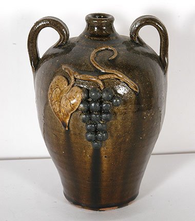 Anita Meaders. Grape Decorated Vase.: Anita Meaders. Grape Decorated Vase. Double-sided. Mint condition. 9”h. Est. $200-300. Ship: $45
