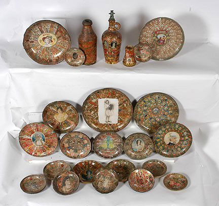 Early Cigar Label Decoupage Art.: Anonymous. 23 Early Cigar Label Decoupage Art. Mixed cigar labels decoupaged on glass bottle, plate and ash trays. Excellent condition. Tallest is 11”h. Largest plate is 9”diameter. Est. $1,000-2,