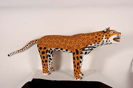 Leroy Archuleta. Very Large Leopard.: Leroy Archuleta. Very Large Leopard. 1993. Signed and dated. Carved and painted wood, glass eyes, plastic toe nails and whiskers. Excellent condition. Size with tail is 85” long x 33”h x 12”h. E