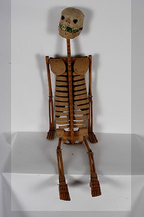Clayton Graham. Skeleton.: Clayton Graham. Skeleton. 1939. Prayersburg, OH. Signed and dated. Homemade with wire, mesh, tin carved wood, metal joints, spring-loaded mouth, cloth over head, in hand-made cardboard box coffin. Ver
