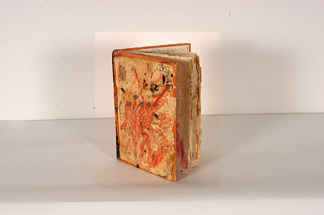 Purvis Young. Book, 1985. : Purvis Young. Book. 1985. Signed and dated. Paint and ink on paper attached to hardcover book. Excellent condition. Approximately 40 decorated pages. 7” x 10”. Provenance: The Private Collection o