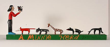 Minnie & Garland Adkins. A Minnie Herd.: Minnie and Garland Adkins. A Minnie Herd. 1993. Signed, dated and titled. Carved and painted wood. Nicks in pig tail, otherwise great condition. 31” x 11” x 3.5”. Est. $400-800. Ship: $75