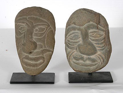 David Marshall. Pair of Stone Heads.: David Marshall. Pair of Stone Heads. Not signed or dated. Carved riverstone. Excellent condition. Average size with display stand is 7.5”h. Est. $200-300. Ship: $45