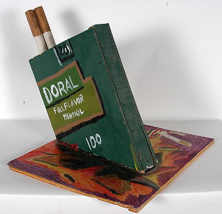Earl Simmons. Doral Cigarettes.: Earl Simmons. Doral Cigarettes. Signed. Not dated. Paint on plywood 3-D sculpture. Excellent condition. 20” x 16”x 17”. Provenance: The private collection of Sherry Kass and Scott Tracy. Est. $2