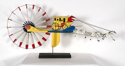 Jim North. Stage Coach Whirligig.: Jim North. Stage Coach Whirligig. c. 1990’s. Signed. Paint on wood, metal blinds, and mixed media. Broken post holding team of horses, otherwise great condition. 84” x 24” x 15”. Provenance: e